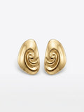 Gold swirl sculptural earrings with high-polish finish, shown as a pair on white background