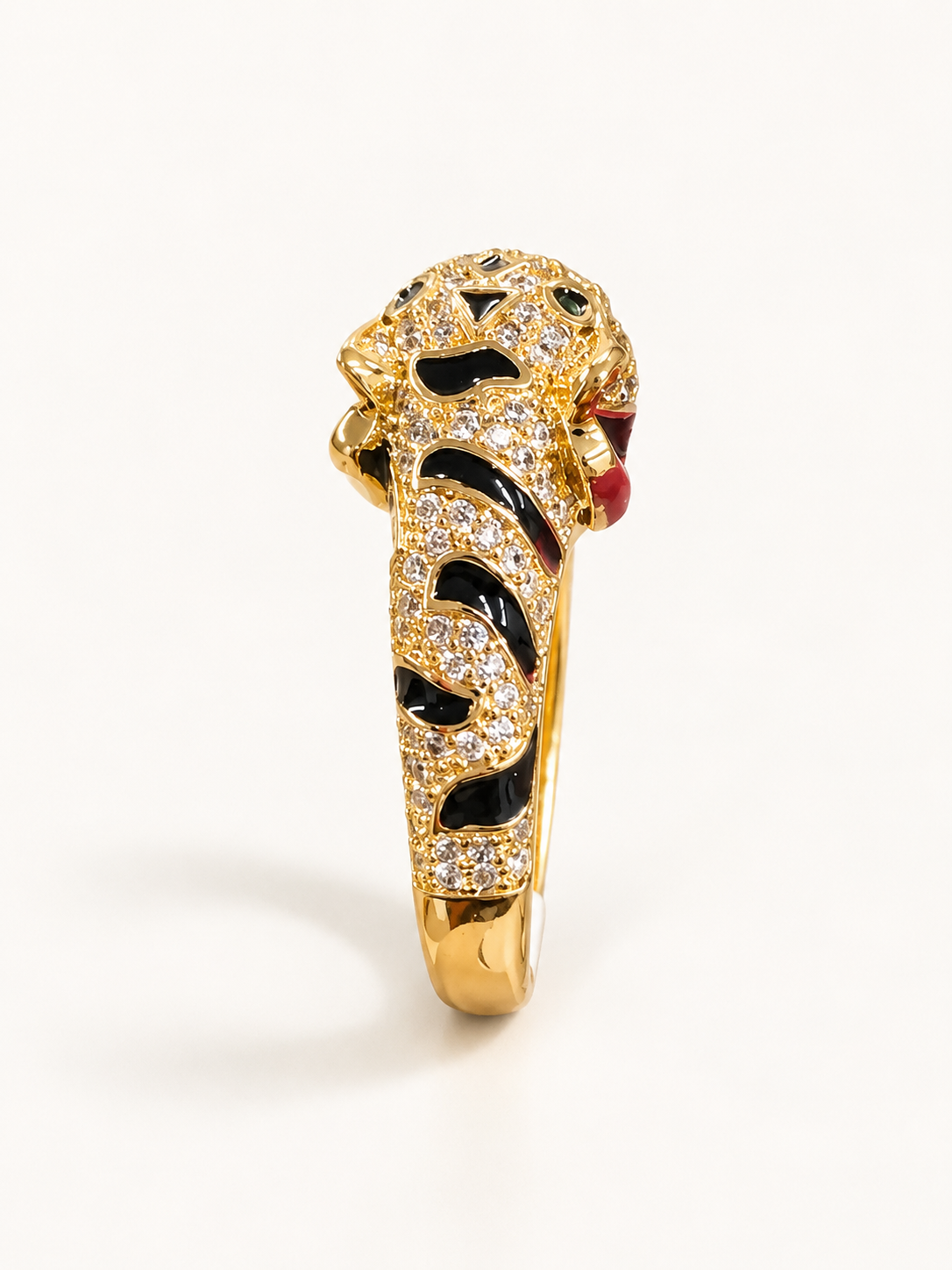 Gold-tone open panther statement ring, side view