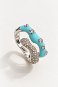 Open silver-tone ring with glossy sky-blue curve and clear circular accents